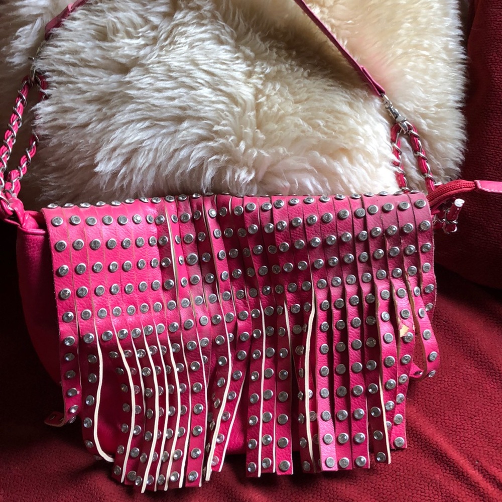 Great shoulder bag. Some Bling fringe!